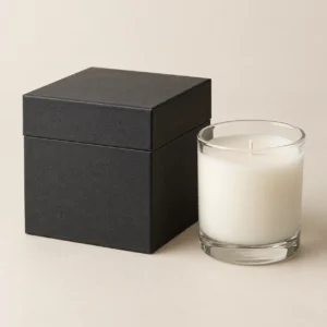 AI concept: charcoal rectangular candle box with a clear glass jar candle, catalog view.