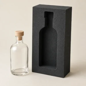 AI concept: dark foam-style fitment with a bottle-shaped cavity, catalog view.