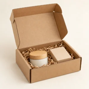 AI concept: brown gift mailer with a jar, a small box and shredded filler, catalog view.