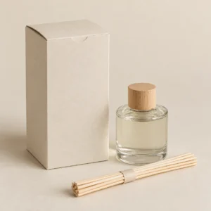 AI concept: tall ivory diffuser carton with a clear bottle and natural-coloured reeds, catalog view.
