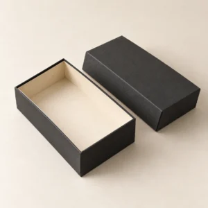 AI concept: charcoal rectangular presentation box with a separate lid and ivory interior, alternate view.